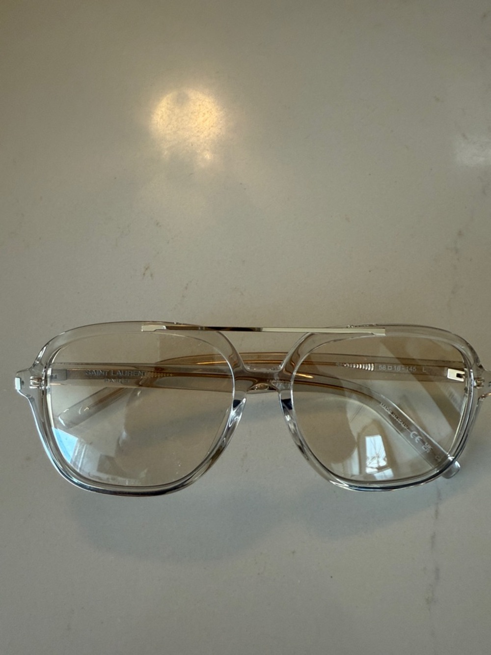 Saint Laurent Clear Frame Glasses with Gold Temples